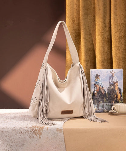 Fringe Studded Hobo Bag